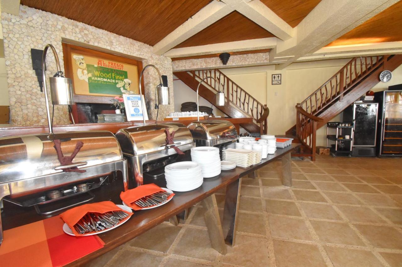 Ambassador In Paradise Balabag  Exterior photo A buffet at a hotel