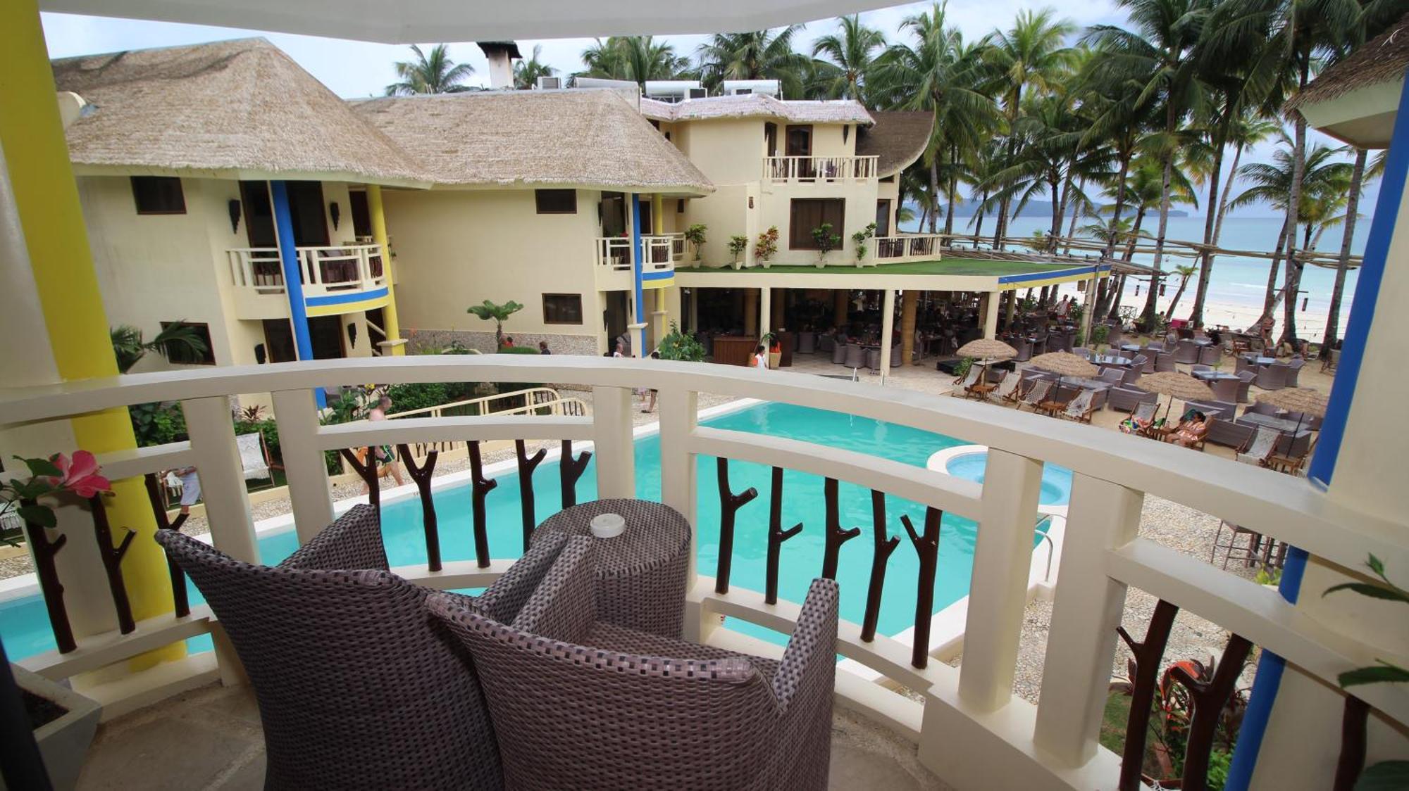 Ambassador In Paradise Balabag  Exterior photo View of the pool at the resort