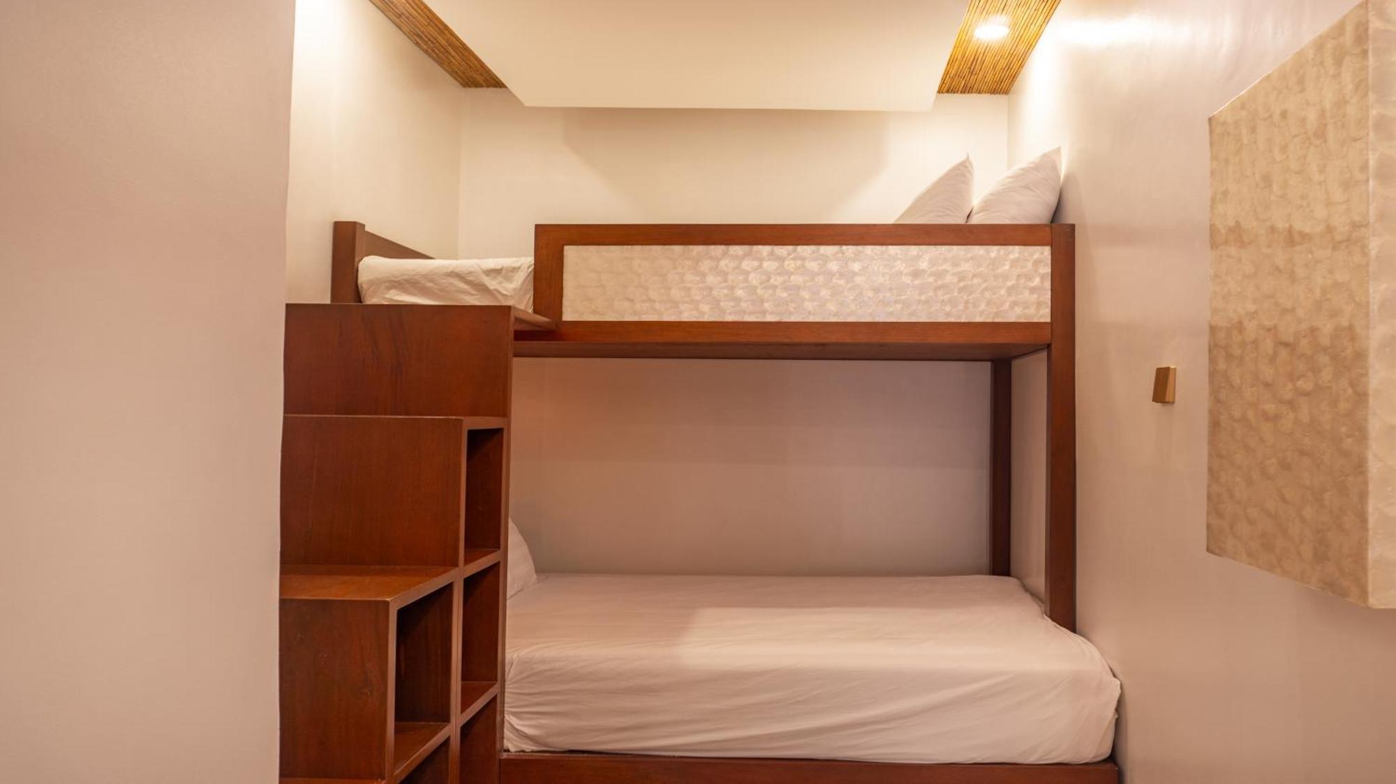Ambassador In Paradise Balabag  Exterior photo A bunk bed